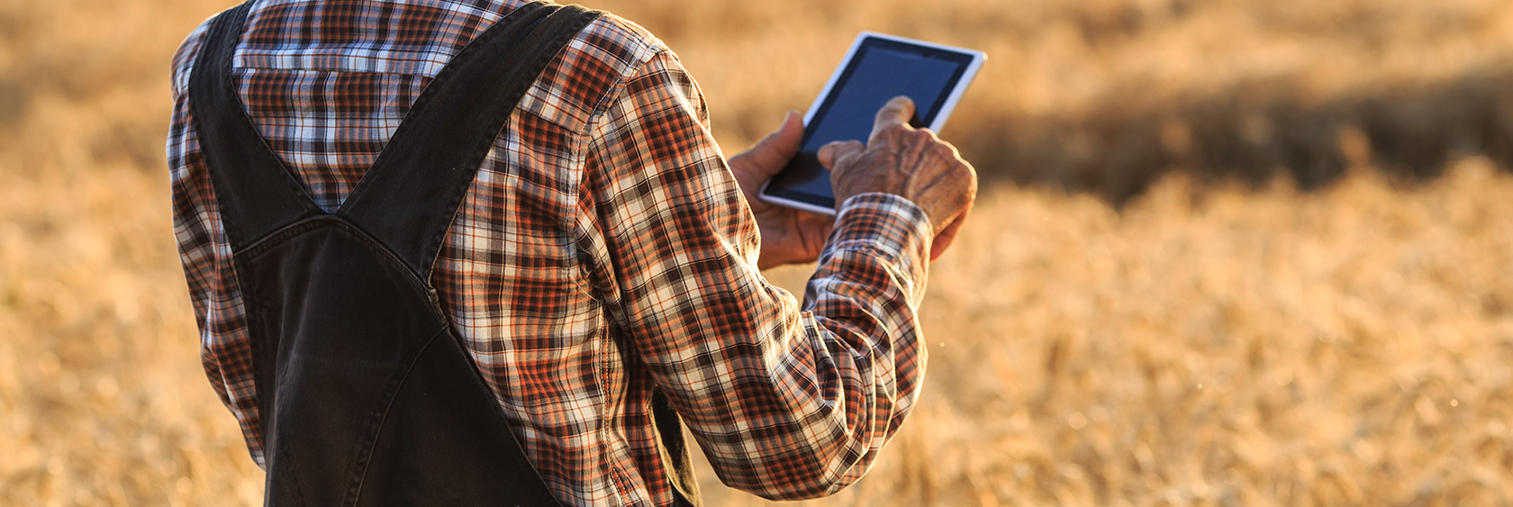 man with ipad